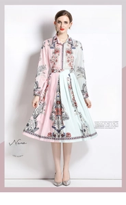 Detail of elegant two-piece set with pink and blue contrast stitching and floral print