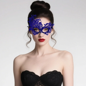 Detailed texture of blue lace phoenix mask with intricate floral hollow design for party