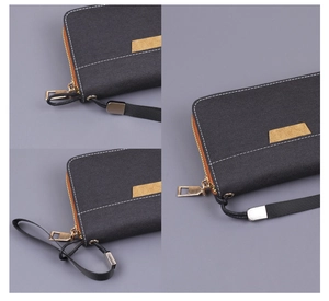 Détail du tissu résistant et de la fermeture éclair métallique sur cette pochette en toile