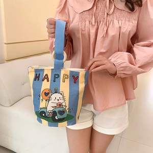 Striped canvas bucket handbag with cartoon cat print and round wooden handles for women