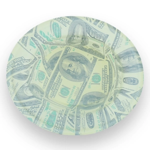 Top view of creative party tray featuring dollar bill patterns on a round plastic surface
