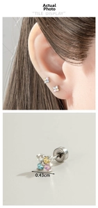 Macro view of 0.43cm small flower cartilage stud earring with colorful zircon stones