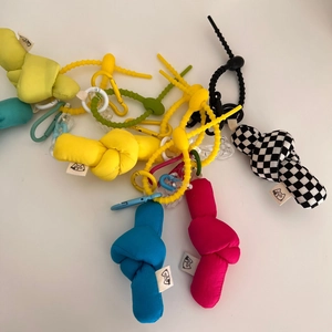 Colorful checkered fabric knot bag charms with matching silicone beads and keychains