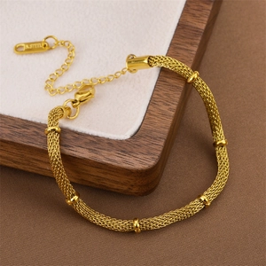 Minimalist gold titanium steel mesh chain bracelet with elegant golden bead accents