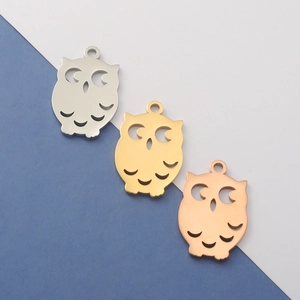 Polished owl pendants in silver, gold, and rose gold finishes for DIY jewelry making
