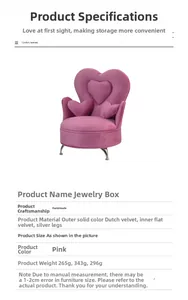 Detail of pink velvet sofa-shaped jewelry box with heart-shaped backrest and metal feet