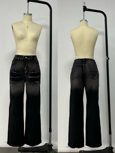 Detailed front and back view of washed gradient black distressed straight-leg jeans