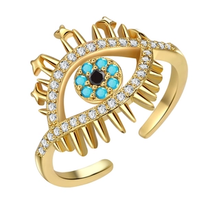Anello aperto Evil Eye dorato con pietre turchesi blu e zirconi bianchi lucidi