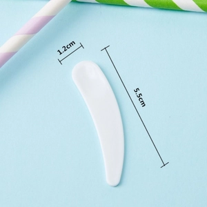 White cosmetic facial mask spoon spatula tool measuring 5.5cm for skincare cream