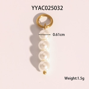 Macro shot of gold-tone star pendant with white pearl detailing, 0.61cm diameter
