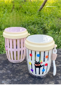 Close-up of pink and white double-layer fruit cups with drainage and portable lanyards
