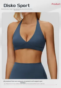 Detail of navy blue halter yoga bra and high-waist leggings on model in studio