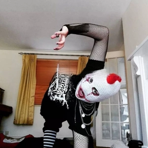 Detailed knit stitches and red clown makeup embroidery on the skull balaclava hat