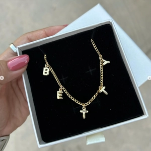 18k gold stainless steel necklace with bubble letter Betty pendant in a gift box