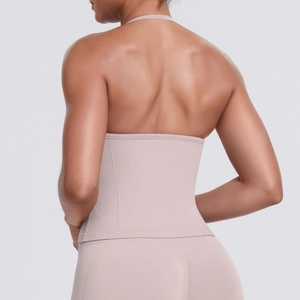 Macro shot of seamless nude compression fabric with breathable knit texture and firm stitching