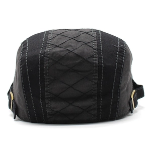 Classic cotton beret hat in black and dark grey with diamond quilting and metal side buckles