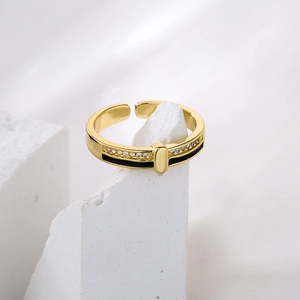Elegant gold-plated open ring with black enamel inlay and zircon accents on white stone