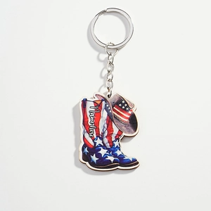 Western cowboy hat and boots keychain with US flag design and customizable name slot