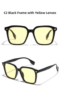 Detail view of square black frames with yellow lenses and golden triangle rivets