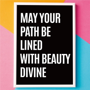 Modern black quote wall art with colorful background panels and a sleek white frame