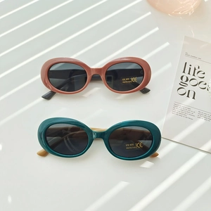 Fashionable kids oval sunglasses with UV400 protection in red and green colors