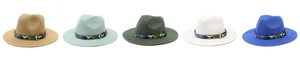 Detail view of colorful wide brim straw sun hats with stylish snakeskin print buckled bands