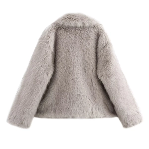 Rear view of short faux fur coat in light gray showing plush texture and wide cut