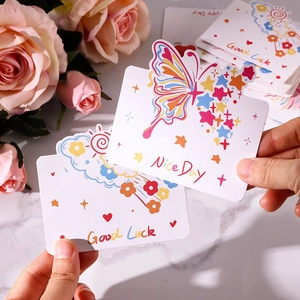 Détail de cartes de vœux avec illustrations colorées et inscription « Nice Day »