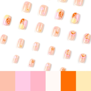 Pink heart and star press-on nails with orange smiley face and wavy line patterns