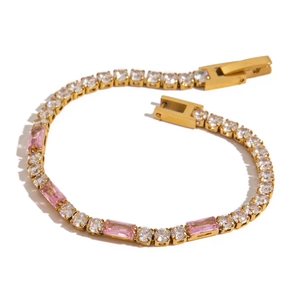 Detailed 45-degree view of gold-plated tennis bracelet with pink and white zircon stones