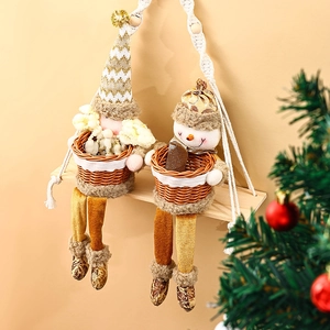 Detailed view of Christmas gnome and snowman plush dolls holding tiny woven baskets