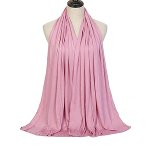 Pink jersey mercerized cotton headscarf for women on a mannequin with soft drape
