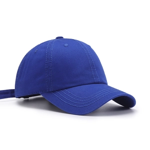 Classic blue cotton baseball cap shown from a 45-degree angle on a white background