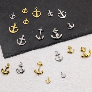Mix of stainless steel anchor and seahorse pendants in gold and silver finish