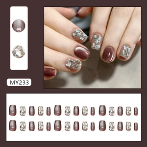 Short square burgundy cat-eye press-on nails with sparkling rhinestones and shell decor