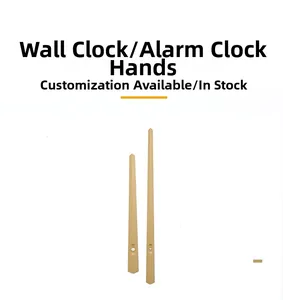 Detail view of gold aluminum quartz clock hands set showing hour and minute needles