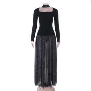Detailed close-up of a square neck long sleeve dress with white polka dot mesh skirt