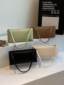 Minimalist rectangular shoulder bags in four colors with smooth matte finish and slim straps
