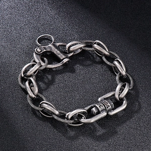 Close-up of industrial retro 304 stainless steel chain bracelet with spring clasp and engraving