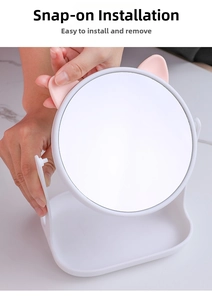 Detail showing the easy snap-on assembly process of the white cat ear makeup mirror base