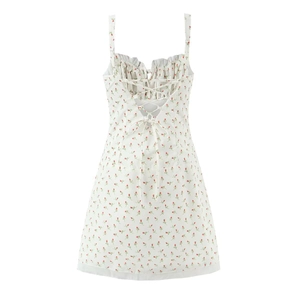 White floral mini sundress with red flower prints and delicate back lacing details