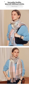 Close-up of soft tassel edges and pink-blue color block pattern on a cozy cashmere scarf