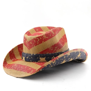Close-up of woven straw texture and star pattern on American flag style cowboy hat