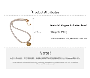 Detail view showing a gold-plated lucky bag pendant on a pearl necklace with sizing info