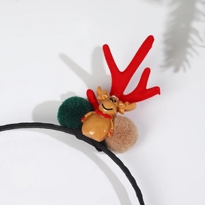 Serre-tête de Noël avec renne en peluche, bois rouges et pompons festifs colorés