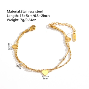 Bracelet double couche en acier inoxydable doré avec breloques cœurs et zircons