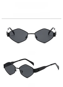 Macro detail of black geometric polygon sunglasses with metal logo on temples