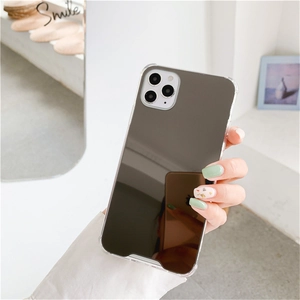 Close-up of shockproof acrylic mirror phone case with reinforced corners and smile design