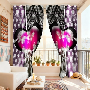 Detail of velvet blackout curtain showing metal rings and pink heart butterfly print