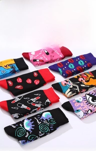 Detail of cotton crew socks with vibrant artistic lip and eye graffiti prints